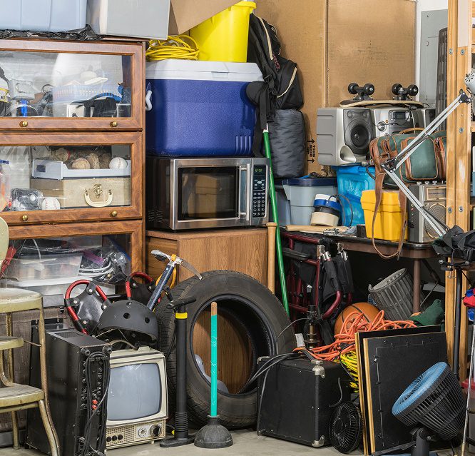 junk removal Tacoma cluttered garage before cleanup