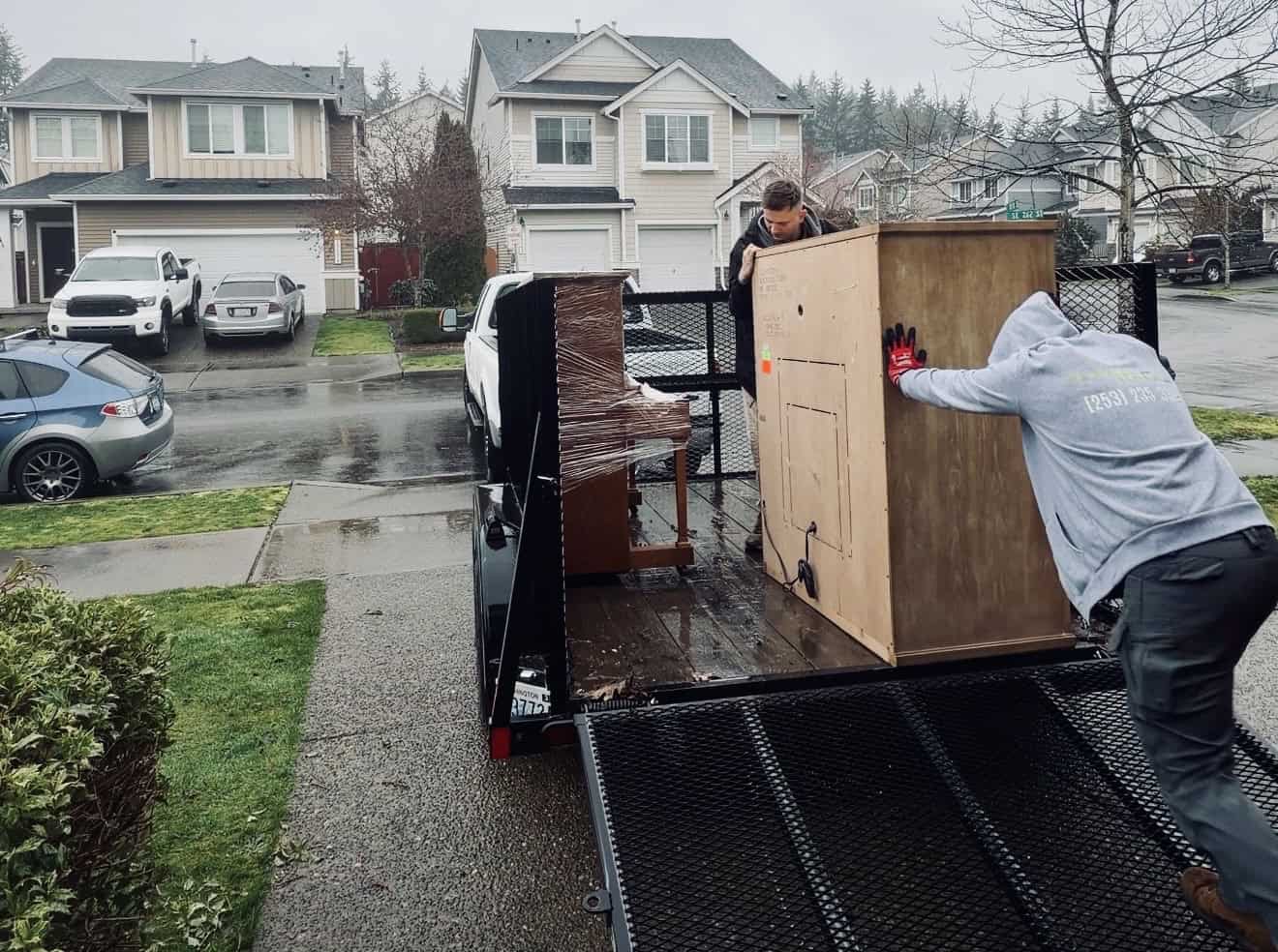 furniture removal Tacoma loading furniture into trailer