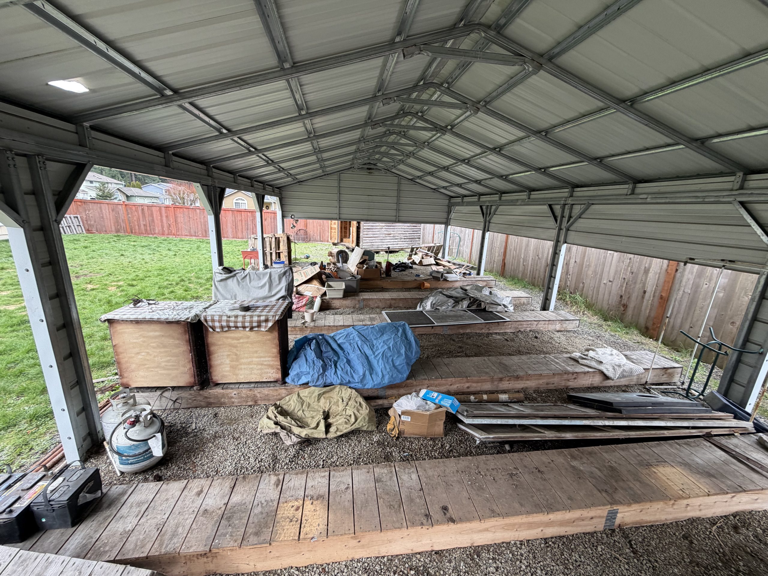 property cleanout Tacoma backyard clutter before cleanup