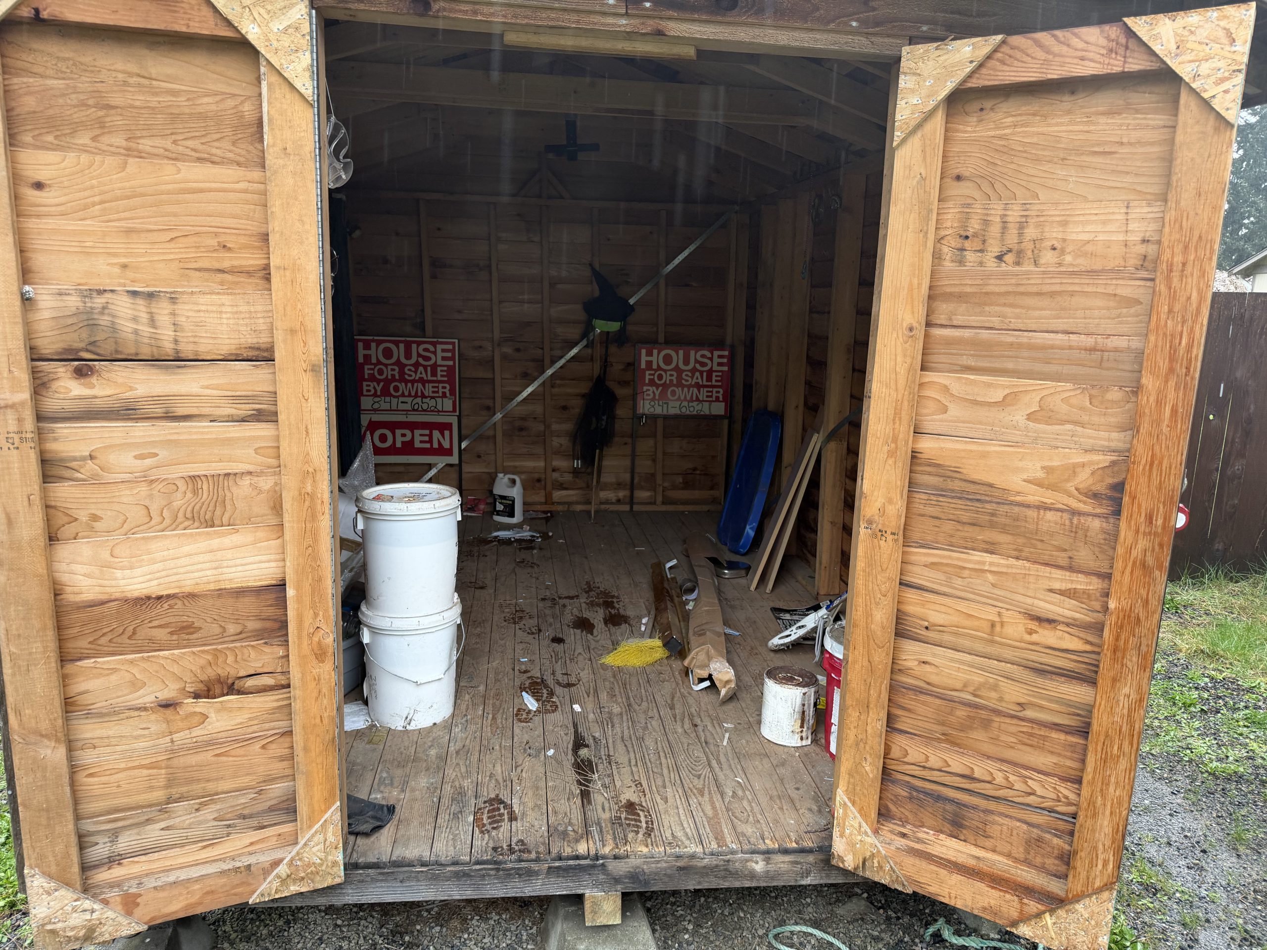 garage cleanout Tacoma shed filled with junk before cleanup