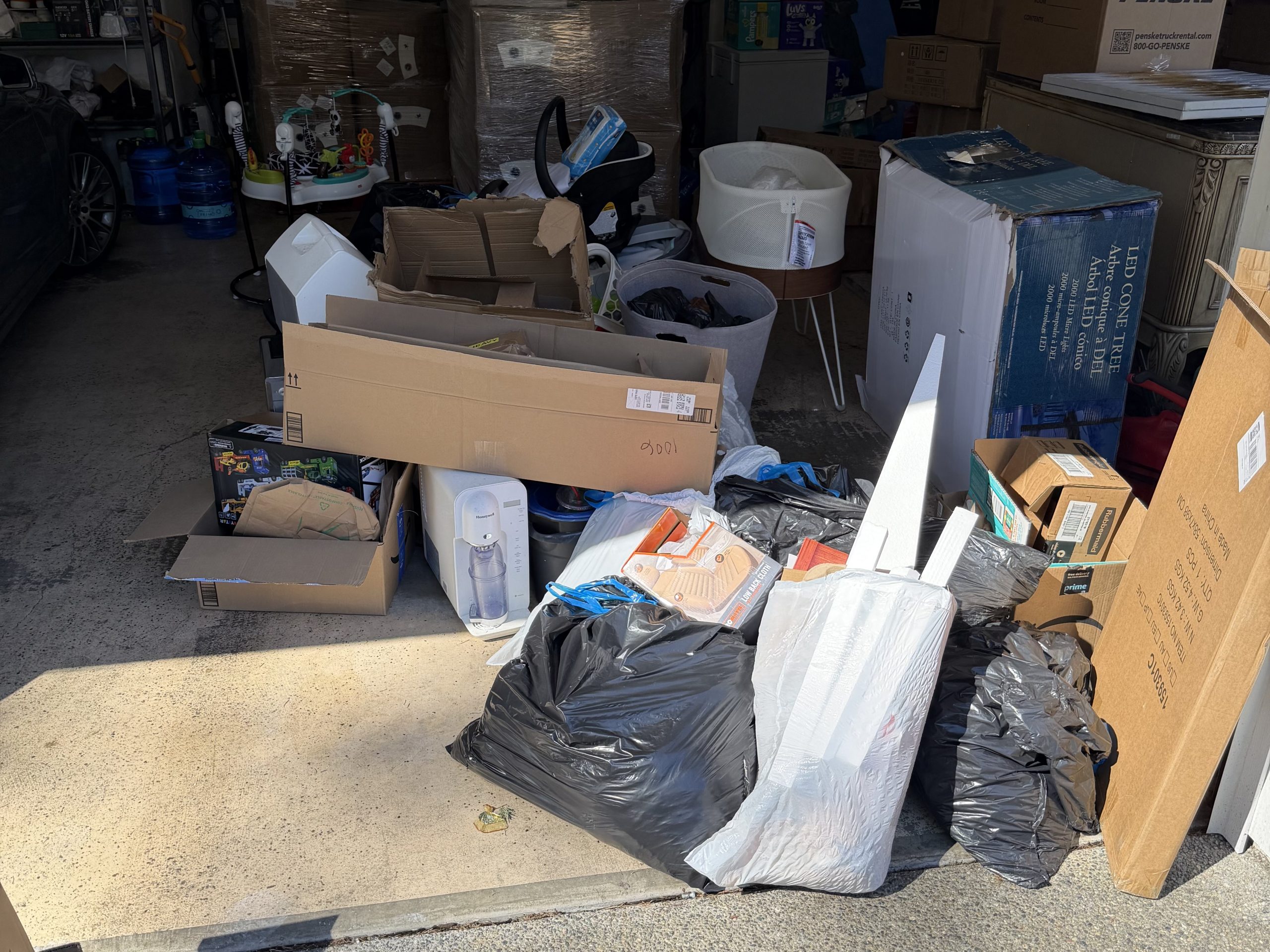 garage cleanout Tacoma cluttered garage before cleanup